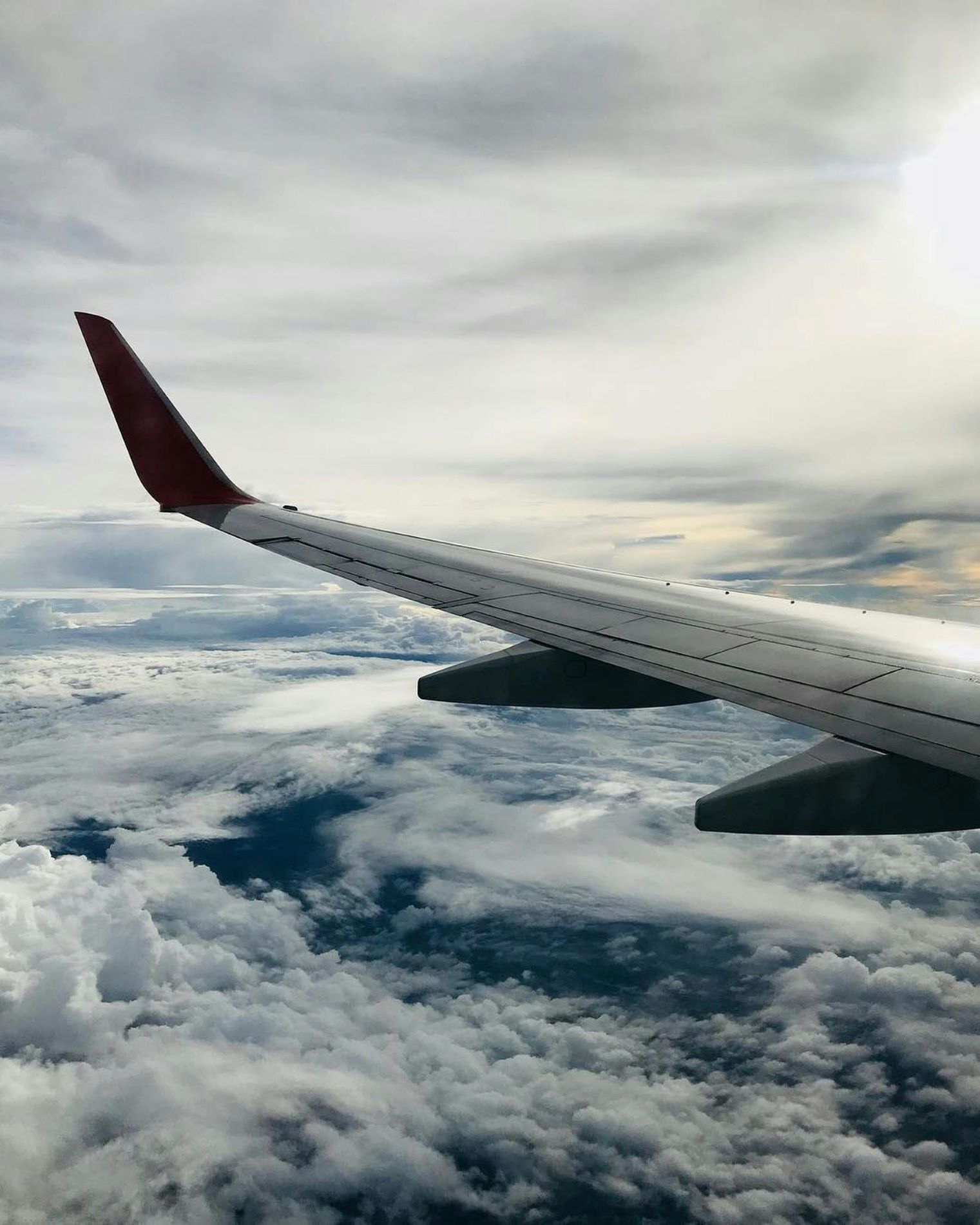 Aerospace industry image: Looking out of a flying plane at its wing